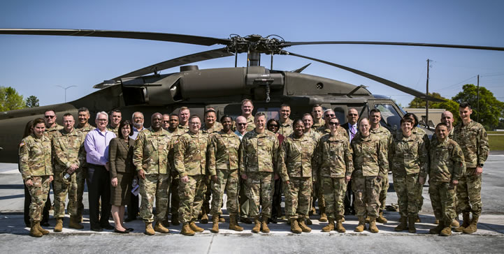 USAMRMC senior leaders with UH-60 Black Hawk helicopter